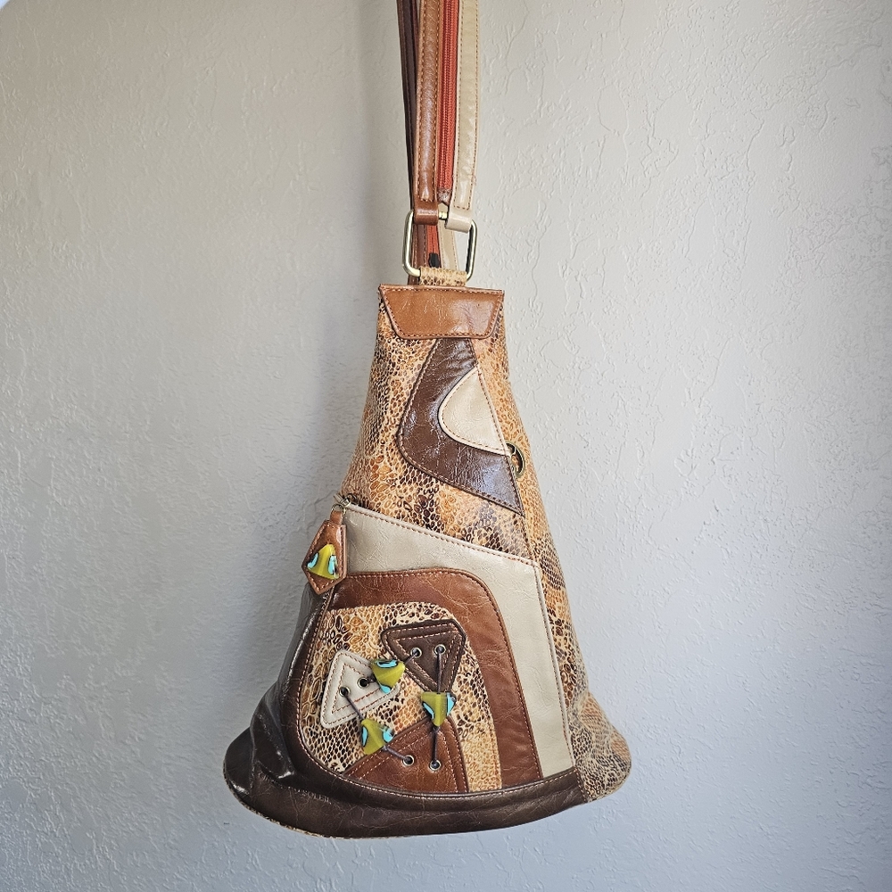 Cirque Du Soleil Backpack Swing Bag In Brown Tan And Orange